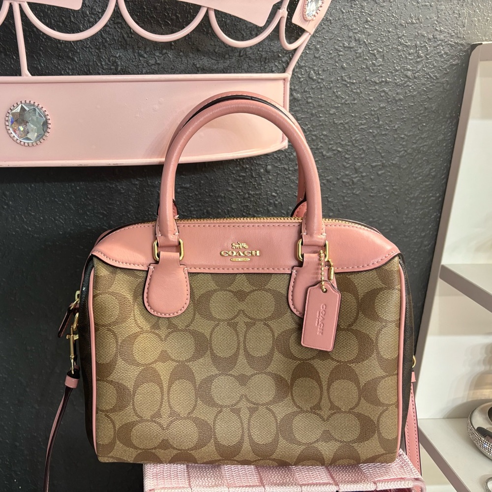 Brown and pink Coach cross body bag